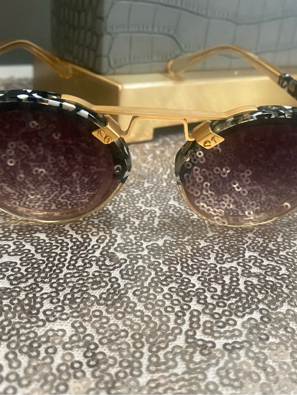 Gold-Tone Round Sunglasses with Black Patterned Brow and Purple Gradient Lenses